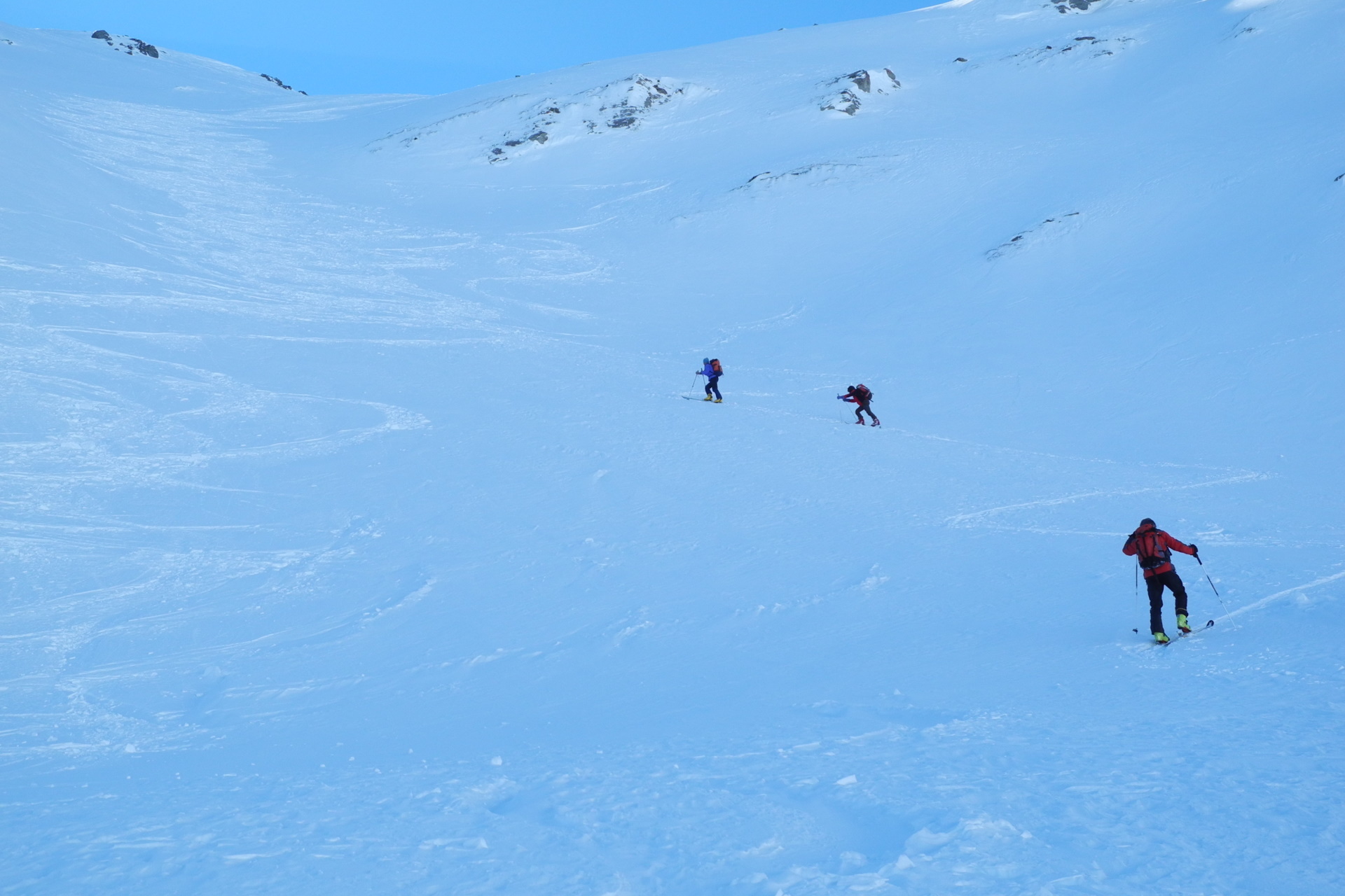 You enter the steep valley that leads to the pass
